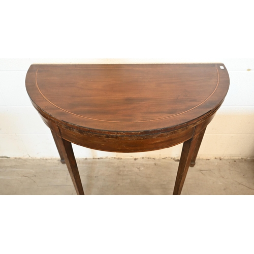 342 - #A 19th century mahogany inlaid demi lune tea table with folding top on tapering square legs, 92 cm ... 