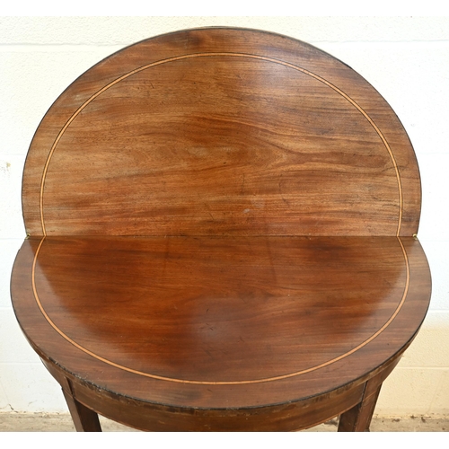 342 - #A 19th century mahogany inlaid demi lune tea table with folding top on tapering square legs, 92 cm ... 