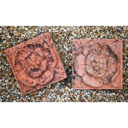 4 - A pair of cast terracotta floral tiles to/w three terracotta pots and two galvanised watering cans (... 