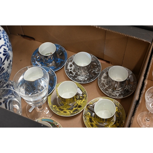 55 - A harlequin set of eight silver resist-ground coffee cups and saucers with chinoiserie decoration to... 