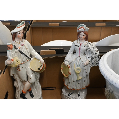 56 - #A Victorian pair of Staffordshire pottery figures of street musicians with monkey to/w seven variou... 