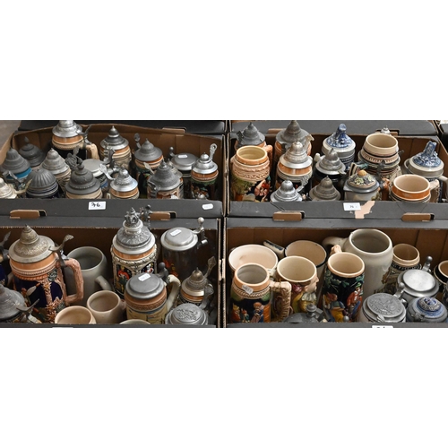 76 - A large collection of over seventy 19th century and later German bier-steins, jugs, mugs etc (4 boxe... 