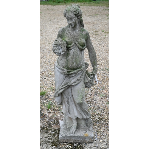 9 - A weathered cast stone garden statue of a classical maiden
