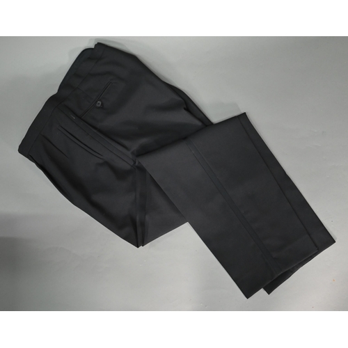 129 - # A Varteks International L48 gent's black dinner jacket and trousers, size L50; a black wool short ... 