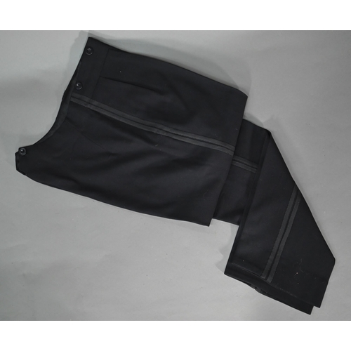 129 - # A Varteks International L48 gent's black dinner jacket and trousers, size L50; a black wool short ... 