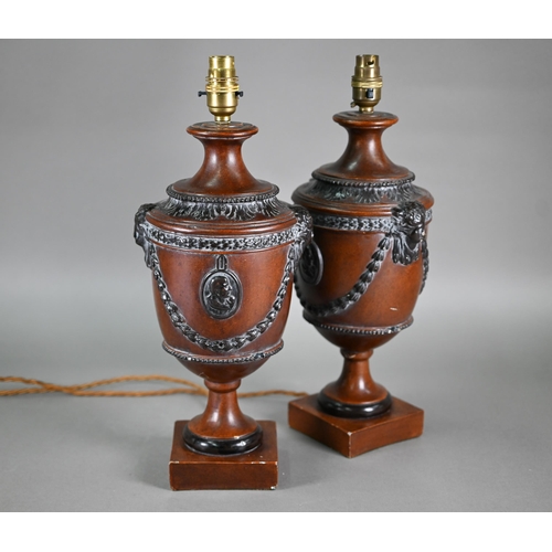 132 - A pair of composite classical urn table lamps