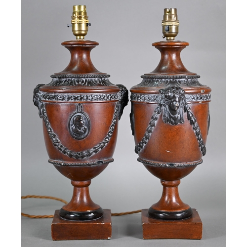 132 - A pair of composite classical urn table lamps