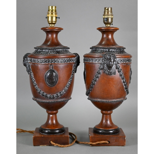 132 - A pair of composite classical urn table lamps