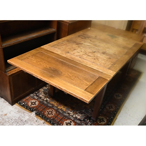 243 - An old oak draw leaf dining table, raised on square legs, 120 cm l x 91 cm w x 76 cm h (212 cm l ful... 