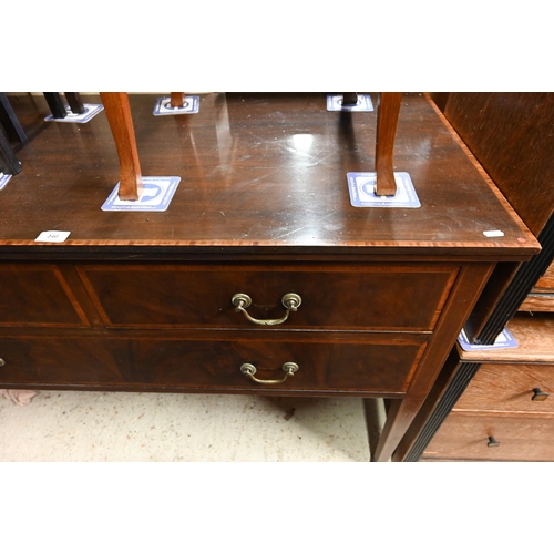 244 - An Edwardian cross-banded walnut three drawer sideboard, raised on square tapering legs on brass cas... 