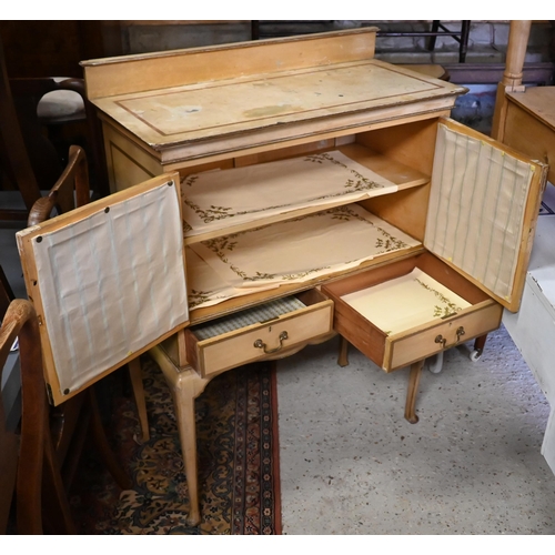 239 - A vintage Italian painted cabinet, with glazed doors over two drawers and raised on cabriole support... 