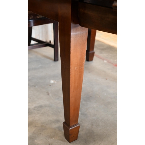 253 - A mahogany draw-leaf extending table on tapering square supports, 195 x 105 x 75 cm high