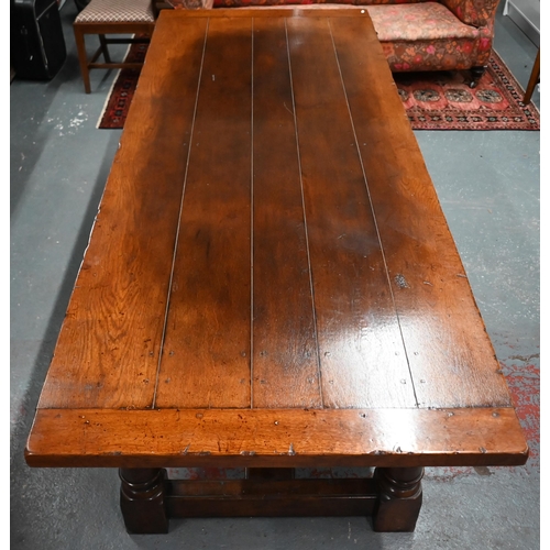 459 - A substantial 17th century style oak refectory table, by Belvedere, Ipswich, the cleated end top rai... 