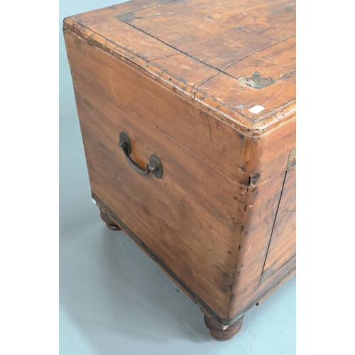 464 - A late 19th century part brass inlaid camphorwood campaign trunk, raised on turned feet, brass handl... 