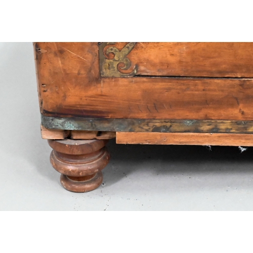 464 - A late 19th century part brass inlaid camphorwood campaign trunk, raised on turned feet, brass handl... 