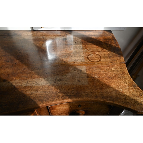 466 - # A 19th century mahogany serpentine sideboard with three drawers raised on square tapering supports... 