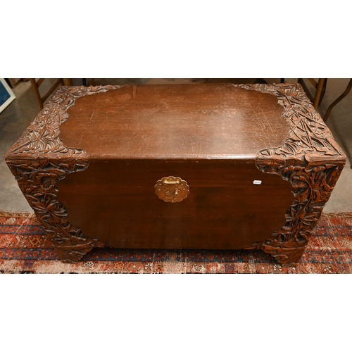 467 - A large Chinese carved hardwood and brass bound blanket chest, camphor-lined interior, 100cm wide x ... 