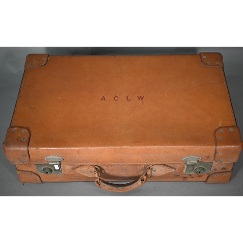 191 - A vintage pigskin suitcase with fitted interior