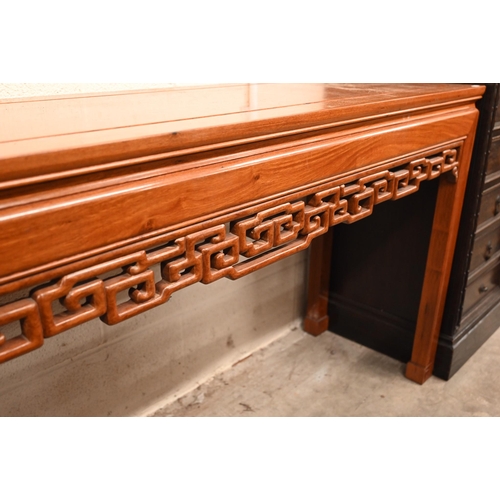 366 - A Chinese hardwood console table with pierced frieze, straight legs with square key-fret feet, 138 x... 