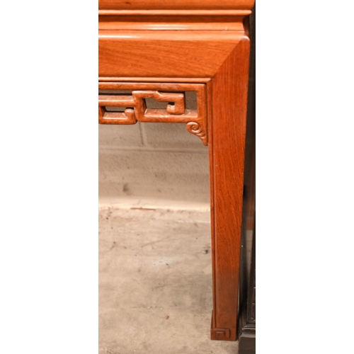 366 - A Chinese hardwood console table with pierced frieze, straight legs with square key-fret feet, 138 x... 