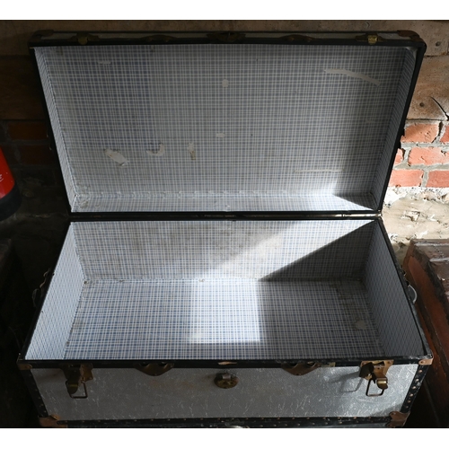 13 - A pair of vintage zinc school type luggage trunks by Mossman, London, 90 cm x 51 cm x 35 cm h to/wit... 