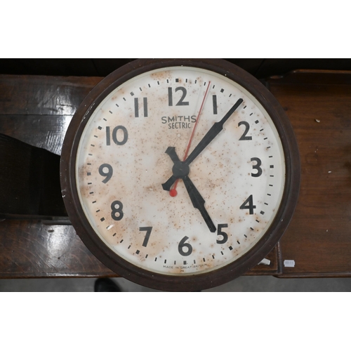 143 - A World War II vintage NAAFI canteen wall clock (Smiths 8 day with clockwork movement), 36 cm diam o... 