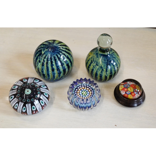 169 - A Perth glass paperweight and two other cane-weights, and two M'dina weights with similar decoration... 