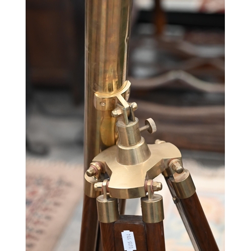 176 - A reproduction brass telescope, 100 cm long, on adjustable wooden tripod