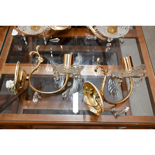 194 - A pair of glass-mounted five branch electroliers on brass-plated frames