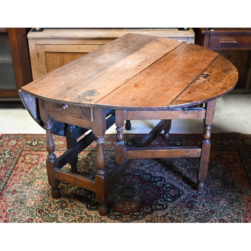 201 - # An antique oak gateleg table, 117 cm (140 cm open) x 46 cm x 73 cm h