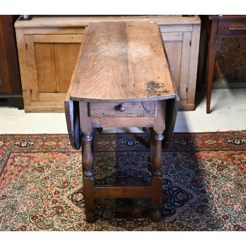 201 - # An antique oak gateleg table, 117 cm (140 cm open) x 46 cm x 73 cm h