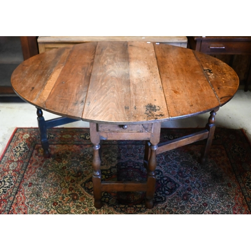 201 - # An antique oak gateleg table, 117 cm (140 cm open) x 46 cm x 73 cm h