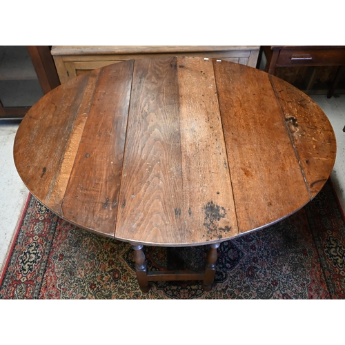 201 - # An antique oak gateleg table, 117 cm (140 cm open) x 46 cm x 73 cm h