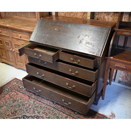 202 - # A George III mahogany fall front bureau, with two short over three long graduated drawers, 112 cm ... 