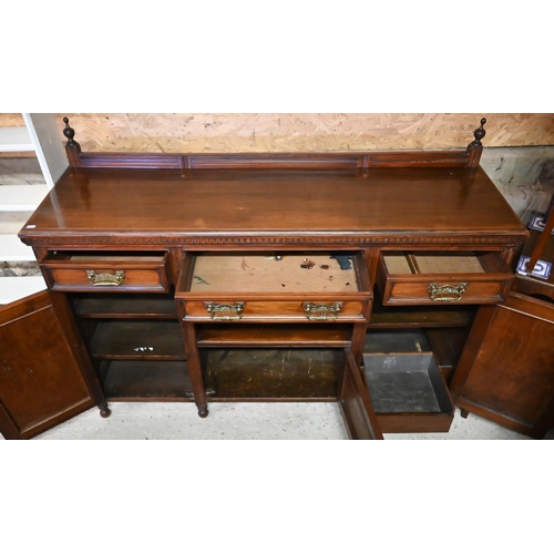 206 - A late 19th century carved and moulded mahogany sideboard with gallery back, raised on turned feet&n... 