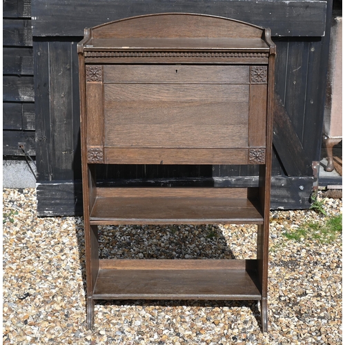 212 - An Art Nouveau period oak fall front student bureau, open shelves below, 71 cm x 25 cm x 122 cm h