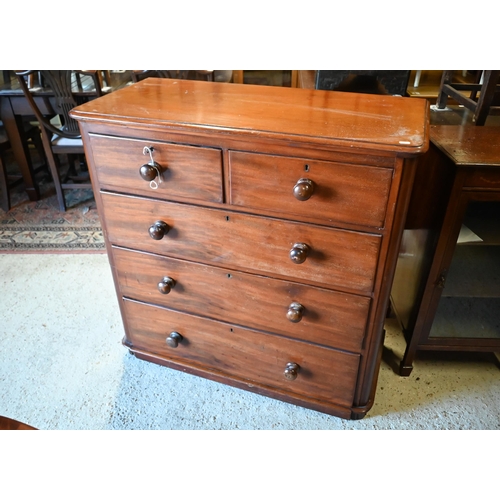 236 - A Victorian mahogany chest of two short over three long drawers, each with original turned wooden pu... 