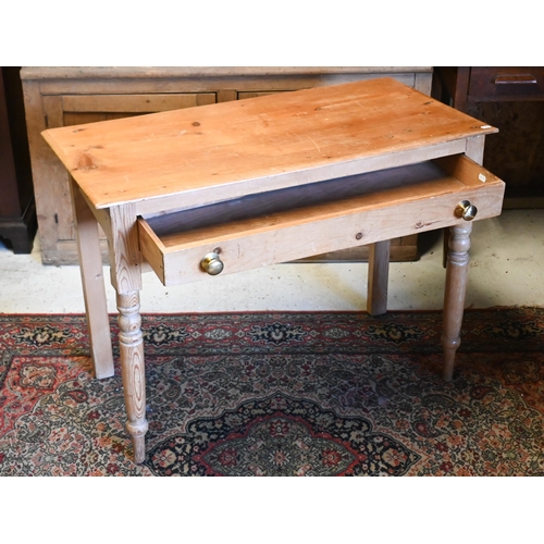 237 - A pine single drawer side table raised on turned legs, 98 cm x 48 cm x 72 cm h