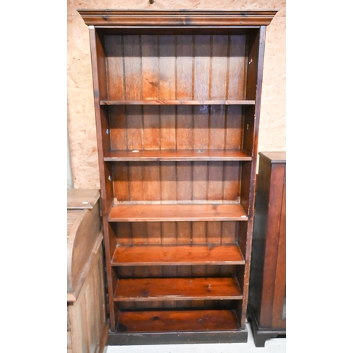 240 - An old stained pine six tier open bookcase, 94 cm x 25 cm x 105 cm h