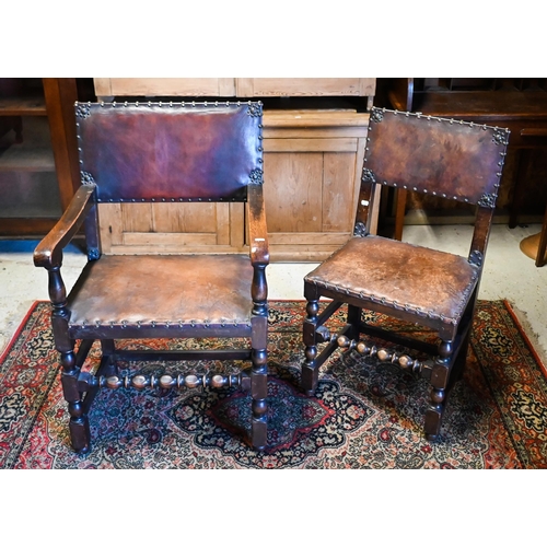 242 - A set of six oak framed brass studded brown leather dining chairs in the 17th century style, compris... 