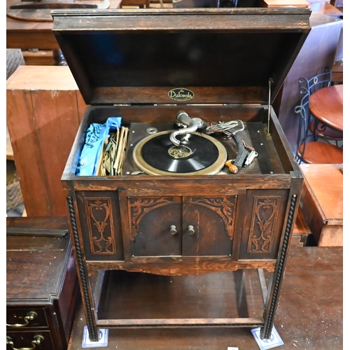 247 - A vintage Dulceola oak cased record player / gramophone cabinet, as found and part missing to/with a... 