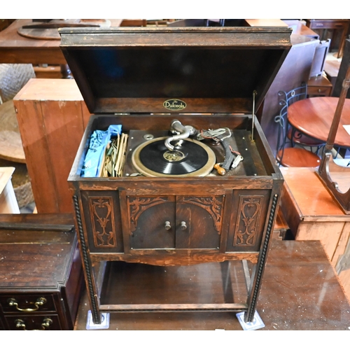 247 - A vintage Dulceola oak cased record player / gramophone cabinet, as found and part missing to/with a... 