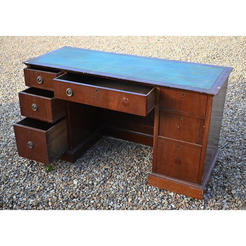 249 - An Edwardian mahogany desk with green leather-top over seven drawers, on plinths, 139 cm x 54 cm x 7... 