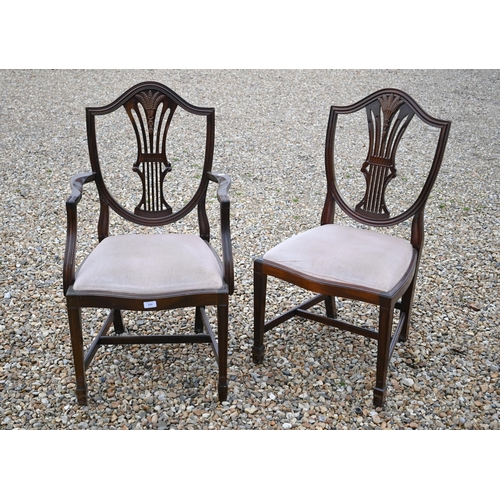 254 - A set of eight reproduction Hepplewhite style sheaf-back dining chairs, with fabric seats (sold for ... 