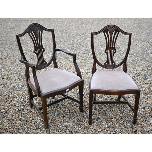 254 - A set of eight reproduction Hepplewhite style sheaf-back dining chairs, with fabric seats (sold for ... 