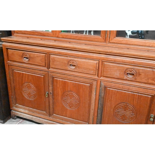 267 - # A Chinese hardwood cabinet bookcase the top with four glazed doors (lacking shelves) on base with ... 