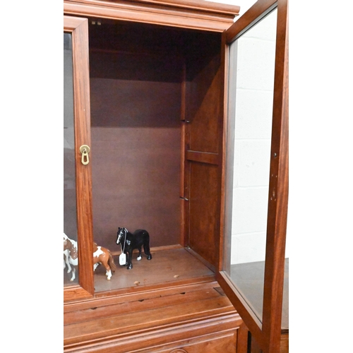 267 - # A Chinese hardwood cabinet bookcase the top with four glazed doors (lacking shelves) on base with ... 