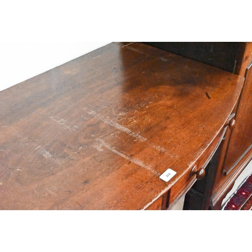 268 - A 19th century mahogany bowfront side table with twin frieze drawers, on ring-turned supports, 107cm... 