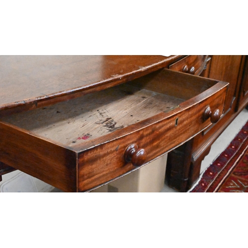 268 - A 19th century mahogany bowfront side table with twin frieze drawers, on ring-turned supports, 107cm... 