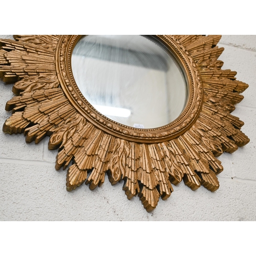 278 - A vintage circular wall mirror in gilt 'sunburst' frame, 64 cm diam overall